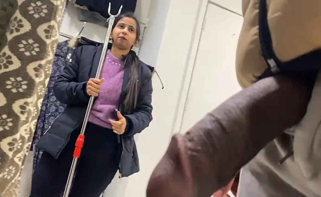 Cute brunette and friendly store employee