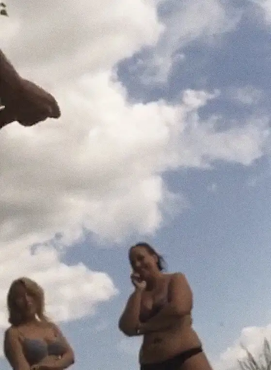 Two friends chatting and watching the stranger masturbating on the street