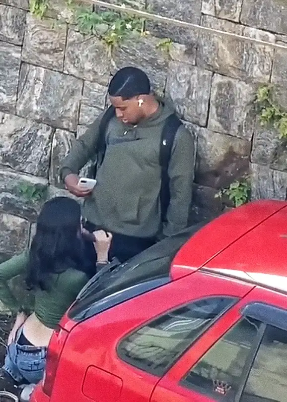 Brazilian teen caught sucking black cock on the street