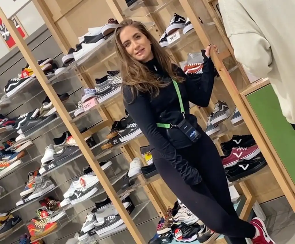 Hot saleswoman looking at customer's bulge, she liked it