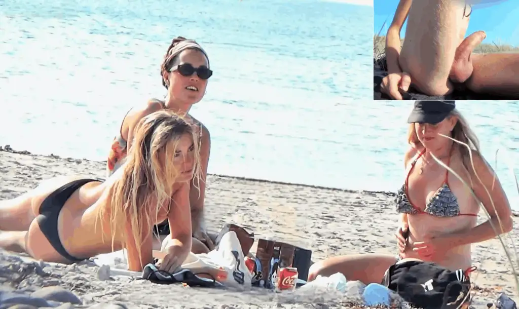 Hot girls sunbathing on the beach and checking out the big hard cock