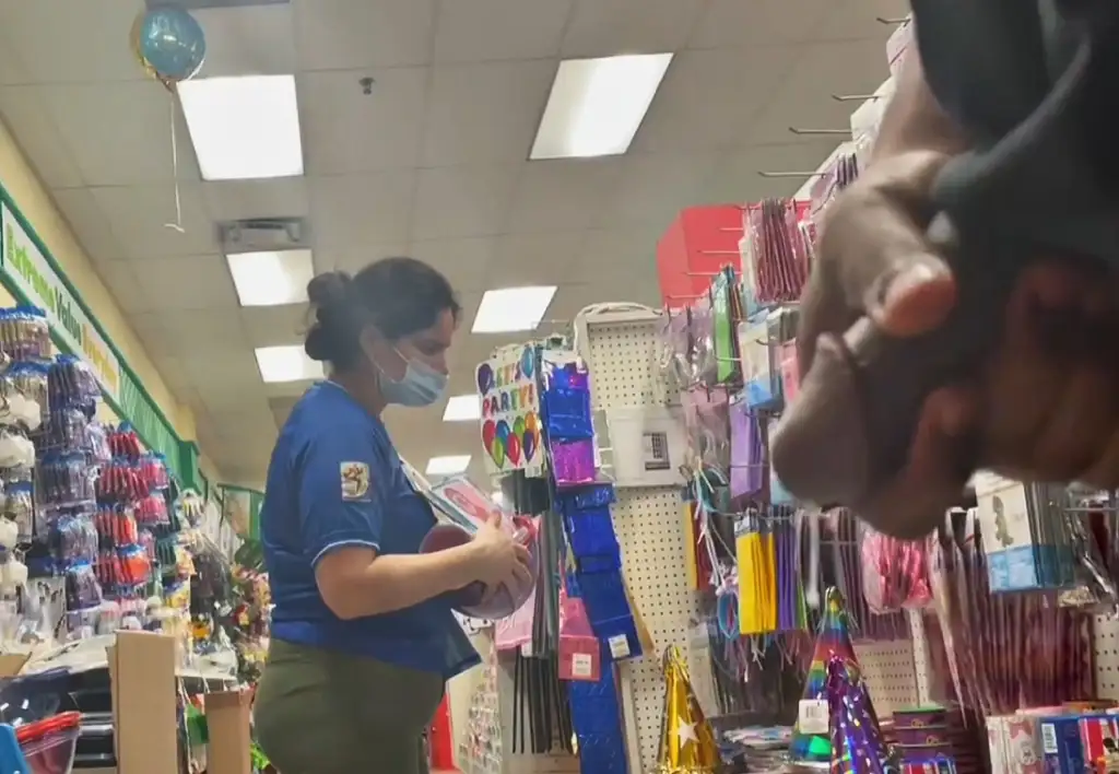 Sexy Latina looking at products and black cock cumming