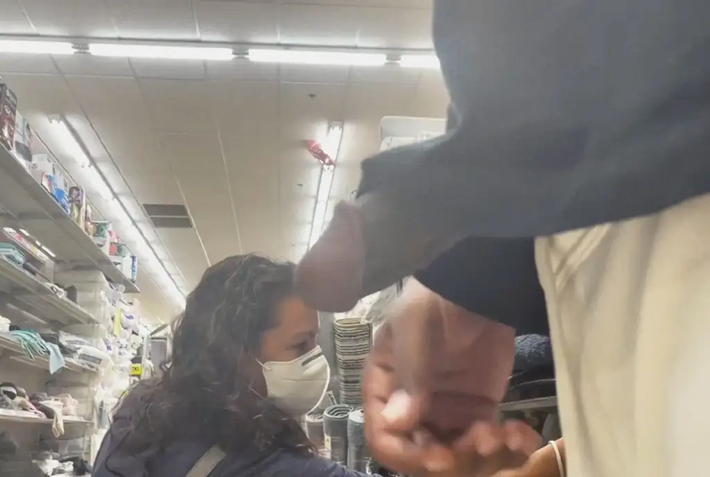 Sexy curly-haired MILF with her daughter at the store