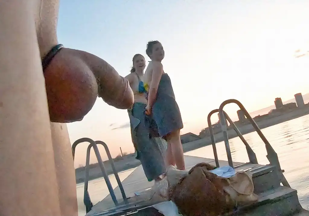 Two friendly friends bathing at the beach