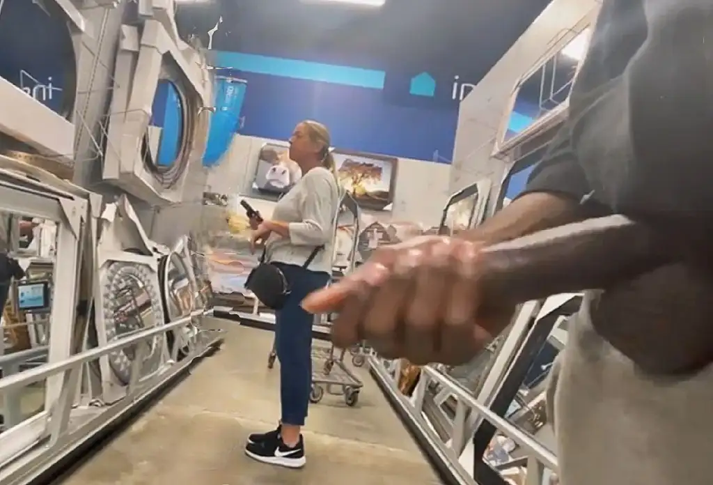 Sexy MILF looking in the mirrors and seeing the big cock in the reflection