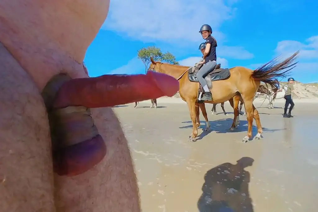 Friends riding horses on the beach, they saw the penis