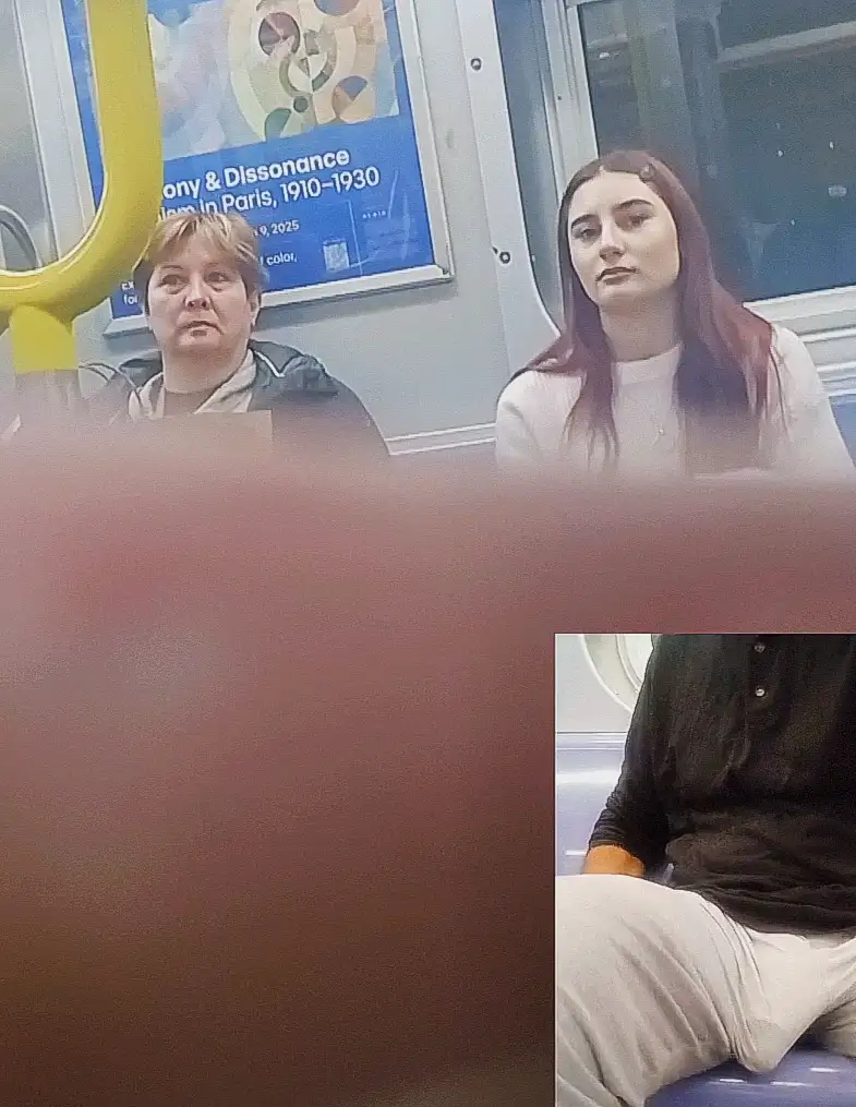 Redhead teen and her mother on the train, she kept staring at the bulge