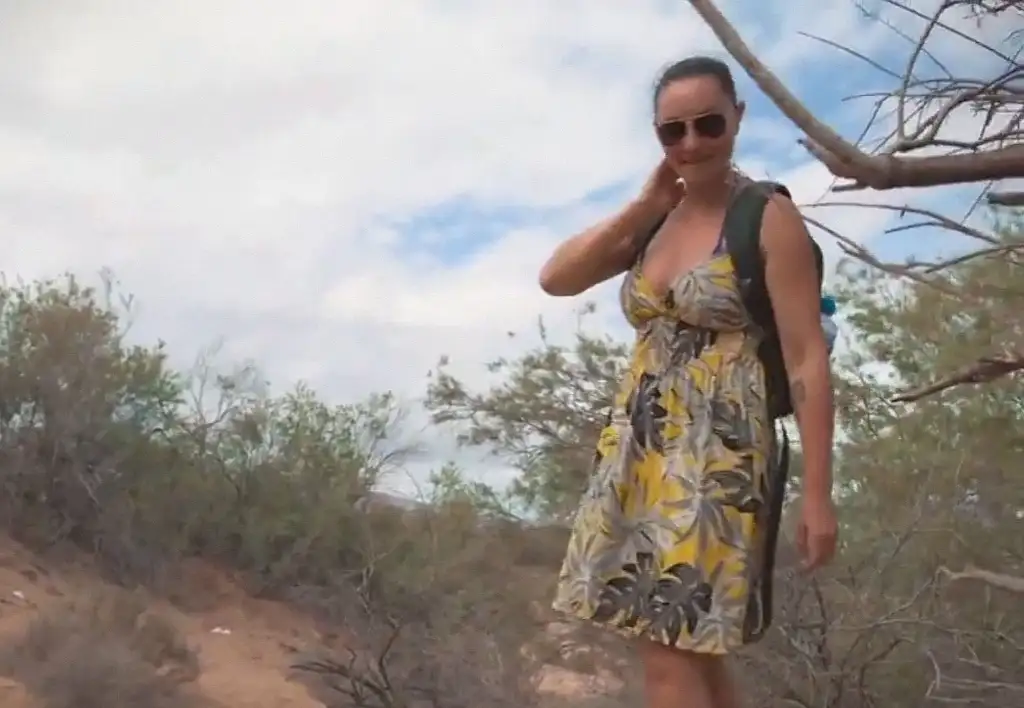 A sexy blonde saw the pervert masturbating on the trail, so she decided to help him out