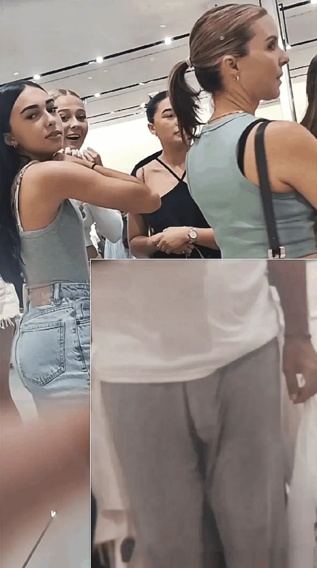 A group of friends checking out the bulge in the store, they like it